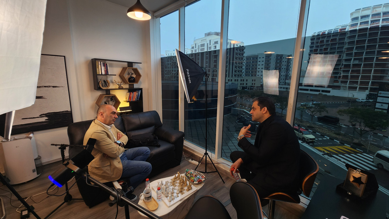 Studio interview setup with lighting and seating